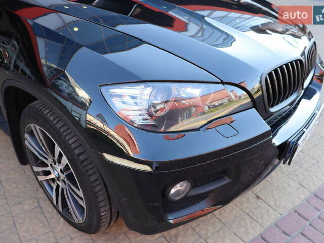 Чорний БМВ Х6, об'ємом двигуна 3 л та пробігом 166 тис. км за 25900 $, фото 4 на Automoto.ua