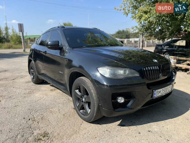 Черный БМВ Х6, объемом двигателя 3 л и пробегом 263 тыс. км за 14499 $, фото 1 на Automoto.ua