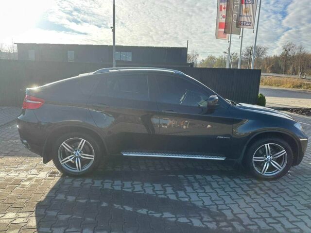 Черный БМВ Х6, объемом двигателя 3 л и пробегом 270 тыс. км за 21500 $, фото 1 на Automoto.ua