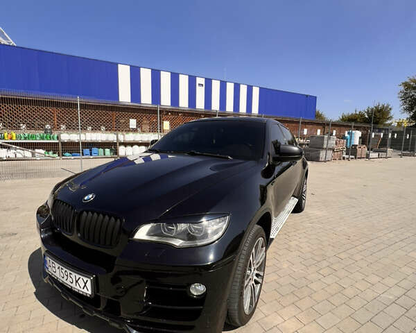 Черный БМВ Х6, объемом двигателя 3 л и пробегом 208 тыс. км за 18500 $, фото 1 на Automoto.ua