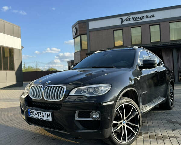 Чорний БМВ Х6, об'ємом двигуна 3 л та пробігом 180 тис. км за 26000 $, фото 1 на Automoto.ua