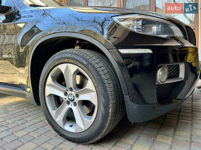Черный БМВ Х6, объемом двигателя 3 л и пробегом 155 тыс. км за 29999 $, фото 23 на Automoto.ua