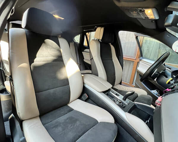 Черный БМВ Х6, объемом двигателя 3 л и пробегом 155 тыс. км за 29999 $, фото 10 на Automoto.ua