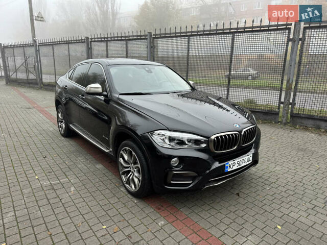 Чорний БМВ Х6, об'ємом двигуна 3 л та пробігом 87 тис. км за 26500 $, фото 1 на Automoto.ua