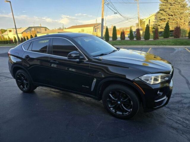 Черный БМВ Х6, объемом двигателя 3 л и пробегом 73 тыс. км за 16000 $, фото 7 на Automoto.ua