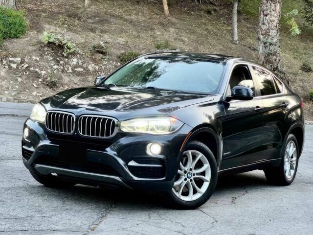 Черный БМВ Х6, объемом двигателя 4.4 л и пробегом 80 тыс. км за 16700 $, фото 2 на Automoto.ua