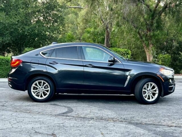 Черный БМВ Х6, объемом двигателя 4.4 л и пробегом 80 тыс. км за 16700 $, фото 5 на Automoto.ua