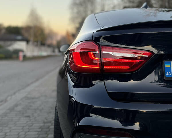 Чорний БМВ Х6, об'ємом двигуна 2.99 л та пробігом 217 тис. км за 35999 $, фото 13 на Automoto.ua