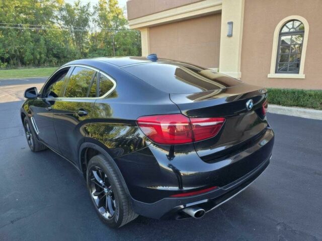 Черный БМВ Х6, объемом двигателя 3 л и пробегом 73 тыс. км за 16000 $, фото 4 на Automoto.ua