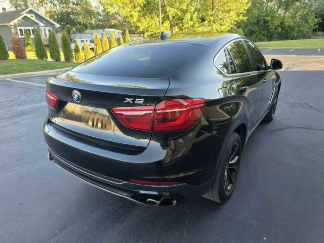 Черный БМВ Х6, объемом двигателя 3 л и пробегом 73 тыс. км за 16000 $, фото 5 на Automoto.ua