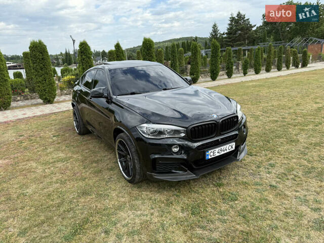 Черный БМВ Х6, объемом двигателя 2.98 л и пробегом 174 тыс. км за 33500 $, фото 3 на Automoto.ua