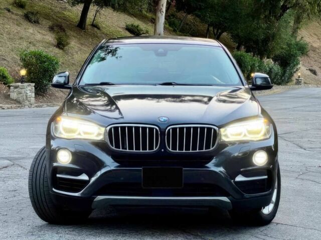 Черный БМВ Х6, объемом двигателя 4.4 л и пробегом 80 тыс. км за 16700 $, фото 1 на Automoto.ua