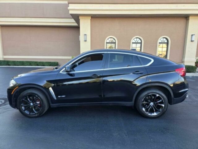 Черный БМВ Х6, объемом двигателя 3 л и пробегом 73 тыс. км за 16000 $, фото 3 на Automoto.ua