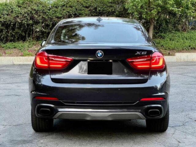Черный БМВ Х6, объемом двигателя 4.4 л и пробегом 80 тыс. км за 16700 $, фото 4 на Automoto.ua