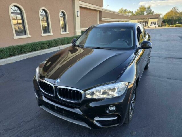 Черный БМВ Х6, объемом двигателя 3 л и пробегом 73 тыс. км за 16000 $, фото 2 на Automoto.ua