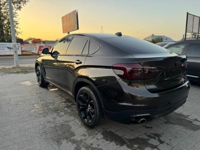 Черный БМВ Х6, объемом двигателя 3 л и пробегом 170 тыс. км за 23000 $, фото 2 на Automoto.ua