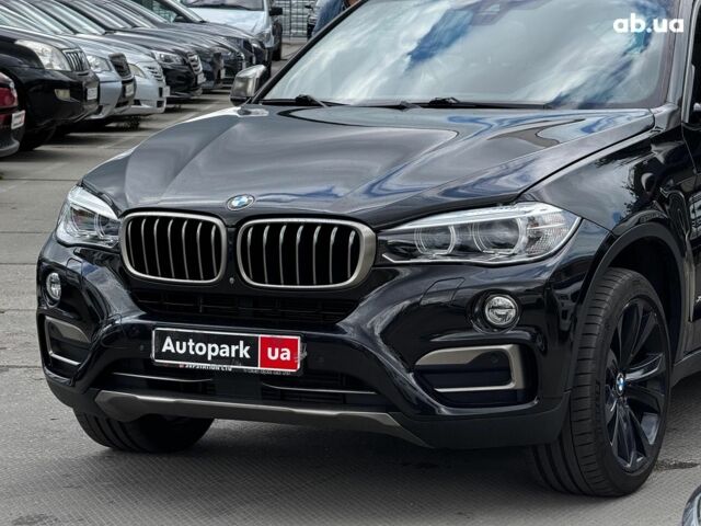 Чорний БМВ Х6, об'ємом двигуна 3 л та пробігом 144 тис. км за 28990 $, фото 1 на Automoto.ua
