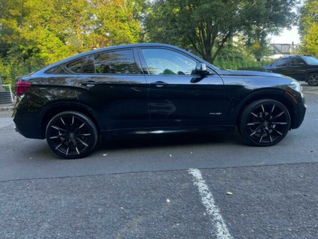 Черный БМВ Х6, объемом двигателя 3 л и пробегом 80 тыс. км за 17000 $, фото 7 на Automoto.ua