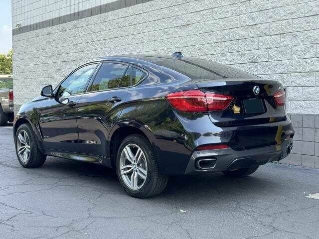 Черный БМВ Х6, объемом двигателя 3 л и пробегом 47 тыс. км за 8900 $, фото 1 на Automoto.ua