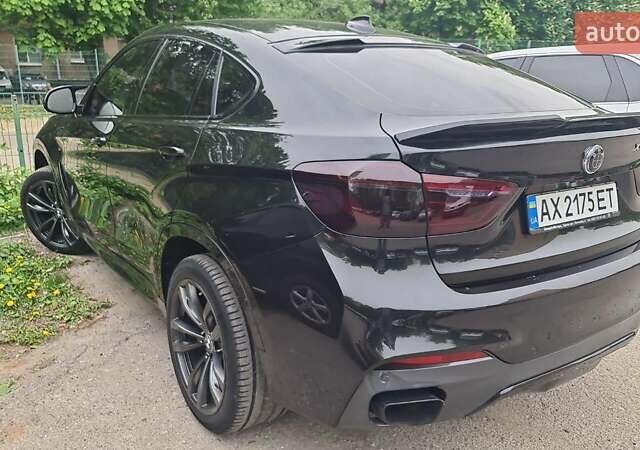 Чорний БМВ Х6, об'ємом двигуна 2.99 л та пробігом 184 тис. км за 41000 $, фото 6 на Automoto.ua