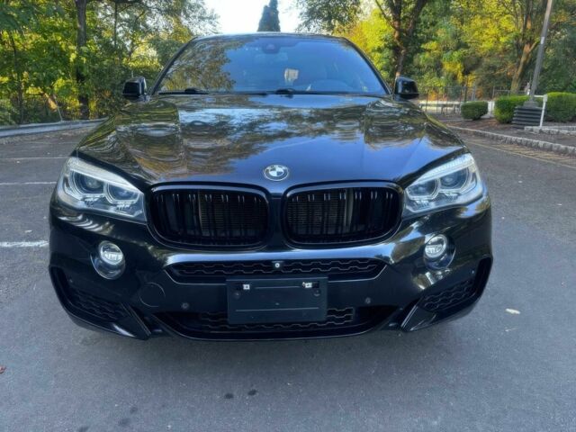 Черный БМВ Х6, объемом двигателя 3 л и пробегом 80 тыс. км за 17000 $, фото 1 на Automoto.ua