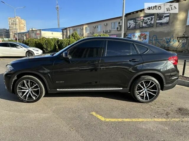 Чорний БМВ Х6, об'ємом двигуна 3 л та пробігом 205 тис. км за 36500 $, фото 3 на Automoto.ua