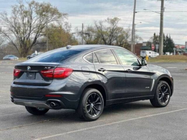 Черный БМВ Х6, объемом двигателя 3 л и пробегом 110 тыс. км за 14100 $, фото 11 на Automoto.ua