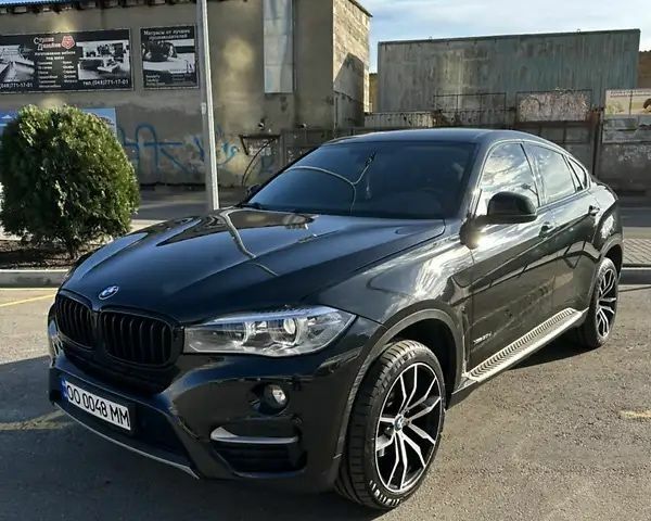 Чорний БМВ Х6, об'ємом двигуна 3 л та пробігом 205 тис. км за 36500 $, фото 2 на Automoto.ua