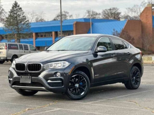 Черный БМВ Х6, объемом двигателя 3 л и пробегом 110 тыс. км за 14100 $, фото 4 на Automoto.ua