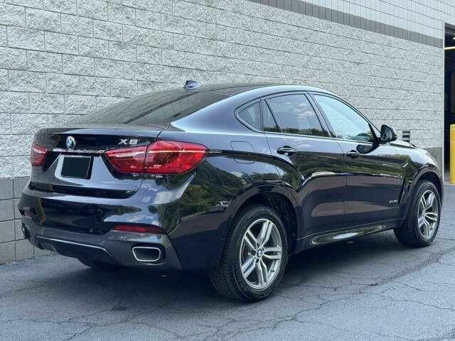 Черный БМВ Х6, объемом двигателя 3 л и пробегом 47 тыс. км за 8900 $, фото 2 на Automoto.ua