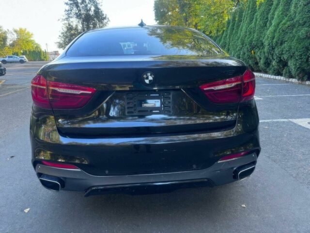 Черный БМВ Х6, объемом двигателя 3 л и пробегом 73 тыс. км за 7400 $, фото 5 на Automoto.ua