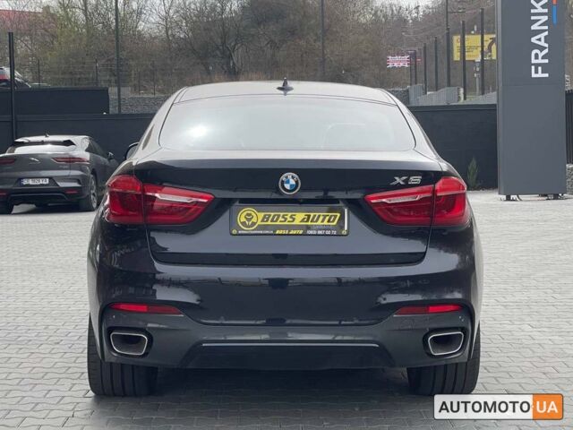 Чорний БМВ Х6, об'ємом двигуна 3 л та пробігом 117 тис. км за 39800 $, фото 4 на Automoto.ua
