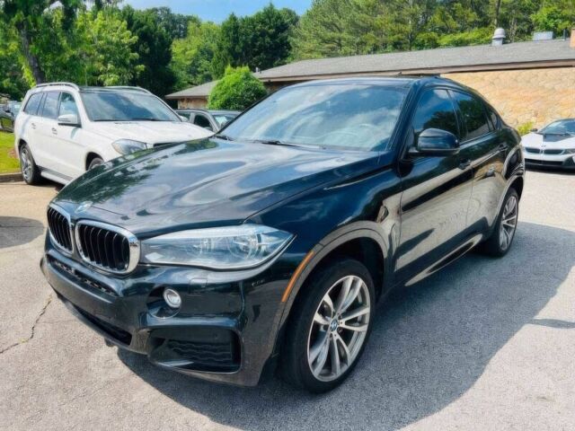 Чорний БМВ Х6, об'ємом двигуна 3 л та пробігом 75 тис. км за 13900 $, фото 1 на Automoto.ua