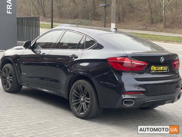 Чорний БМВ Х6, об'ємом двигуна 3 л та пробігом 117 тис. км за 39800 $, фото 3 на Automoto.ua