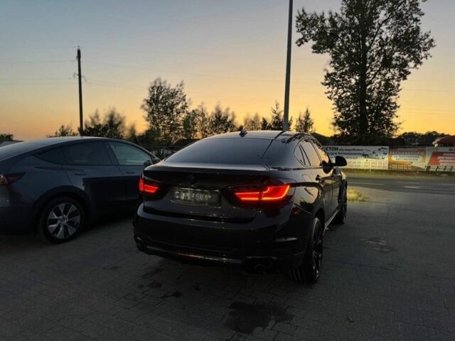 Черный БМВ Х6, объемом двигателя 3 л и пробегом 170 тыс. км за 23000 $, фото 3 на Automoto.ua