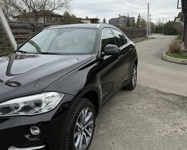 Черный БМВ Х6, объемом двигателя 2.99 л и пробегом 124 тыс. км за 37000 $, фото 1 на Automoto.ua