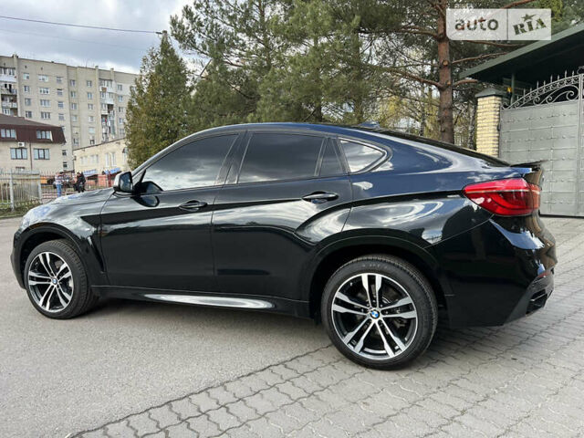 Чорний БМВ Х6, об'ємом двигуна 3 л та пробігом 135 тис. км за 45400 $, фото 5 на Automoto.ua