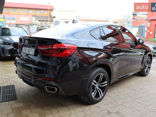 Черный БМВ Х6, объемом двигателя 3 л и пробегом 114 тыс. км за 41400 $, фото 2 на Automoto.ua