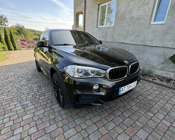 Чорний БМВ Х6, об'ємом двигуна 3 л та пробігом 180 тис. км за 34500 $, фото 4 на Automoto.ua