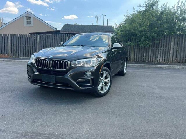 Черный БМВ Х6, объемом двигателя 3 л и пробегом 59 тыс. км за 18500 $, фото 1 на Automoto.ua