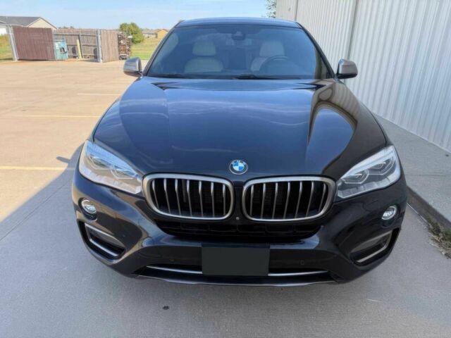 Черный БМВ Х6, объемом двигателя 4.4 л и пробегом 61 тыс. км за 15600 $, фото 1 на Automoto.ua