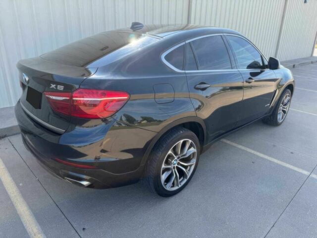 Черный БМВ Х6, объемом двигателя 4.4 л и пробегом 61 тыс. км за 15600 $, фото 5 на Automoto.ua