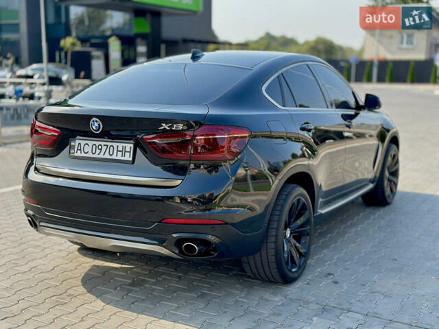 Чорний БМВ Х6, об'ємом двигуна 2.98 л та пробігом 70 тис. км за 38000 $, фото 7 на Automoto.ua