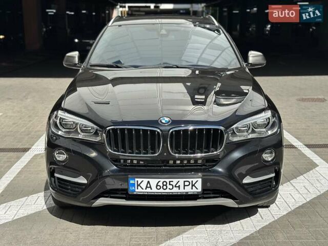 Черный БМВ Х6, объемом двигателя 3 л и пробегом 75 тыс. км за 39300 $, фото 2 на Automoto.ua
