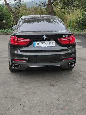 Черный БМВ Х6, объемом двигателя 2.98 л и пробегом 205 тыс. км за 28999 $, фото 3 на Automoto.ua