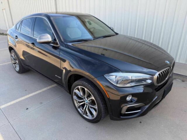 Черный БМВ Х6, объемом двигателя 4.4 л и пробегом 61 тыс. км за 15600 $, фото 2 на Automoto.ua