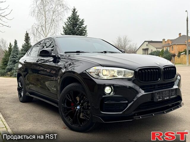 Черный БМВ Х6, объемом двигателя 3 л и пробегом 167 тыс. км за 29999 $, фото 2 на Automoto.ua