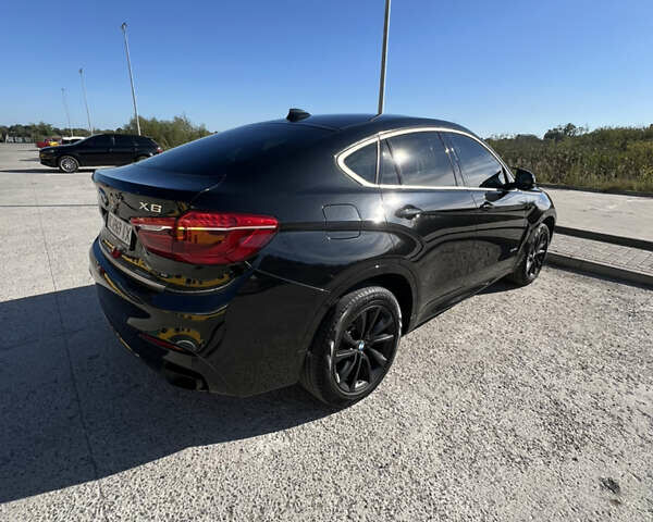 Черный БМВ Х6, объемом двигателя 2.98 л и пробегом 130 тыс. км за 32000 $, фото 3 на Automoto.ua