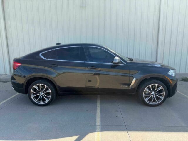 Черный БМВ Х6, объемом двигателя 4.4 л и пробегом 61 тыс. км за 15600 $, фото 3 на Automoto.ua