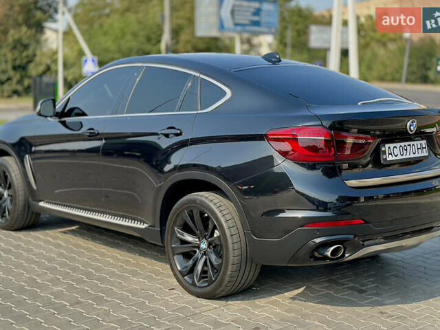 Чорний БМВ Х6, об'ємом двигуна 2.98 л та пробігом 70 тис. км за 38000 $, фото 6 на Automoto.ua